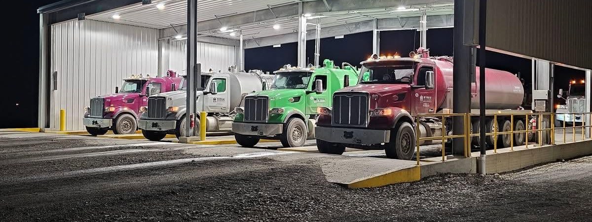 Titan trucks lined up in the yard