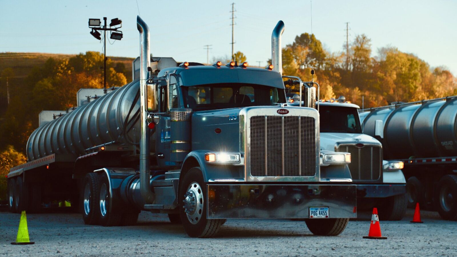 Titan Energy water tanker parked head-on in golden fall light